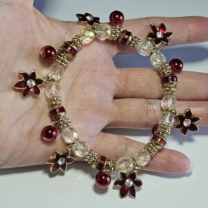 Kenneth Cole Christmas Bracelet Gold Tne Red Poinsettia Glass Bead Charm Stretch